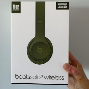 Beats headphones, matte dark green